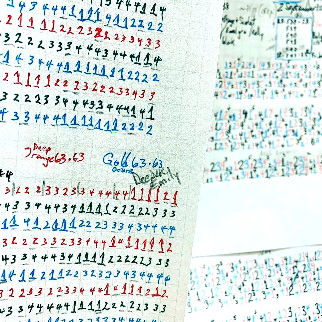 Hand-written weaving drafts by Charles H. Blanchard, the Dyberry Weaver, with numbered threading sequences in red, blue and black ink with color notes for a piece in deep orange and gold
